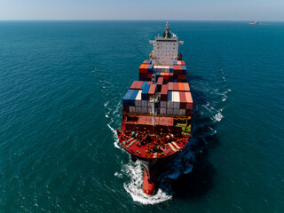 shipping container carrier container sailing in ocean, global business and industry delivery...