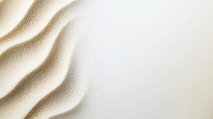 A soft sandy texture gradually transitioning into a clean white space 