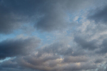 Drifting gray clouds in the sky create an atmosphere of contemplation and melancholy. Symbolizes deep thoughts and memories.