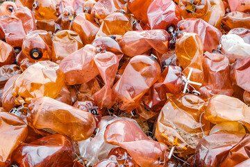 used plastic brown beer kegs in bulk,  garbage environmental pollution