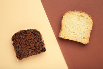 Two different slices toast bread on beige background.