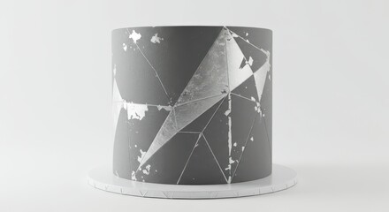 Elegant Gray Cake with Geometric Silver Accents on White Background