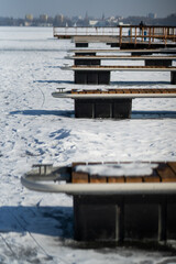 frozen marina - water jetties in the ice