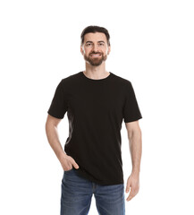 Fototapeta premium Man wearing blank black t-shirt on white background. Mockup for design