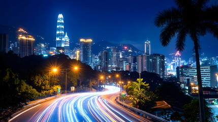 Obraz premium Night Cityscape with Light Trails and Dynamic Traffic Flow