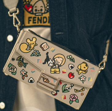 Light grey leather Soft Trunk Baguette bag by Fendi.Milan - Italy,15 March 2025