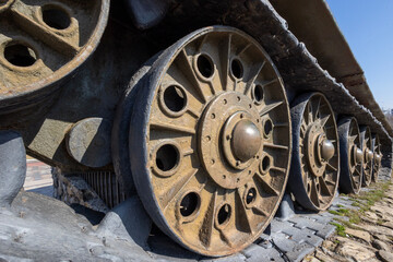 tracks and wheels of a former Soviet army T-34 tank