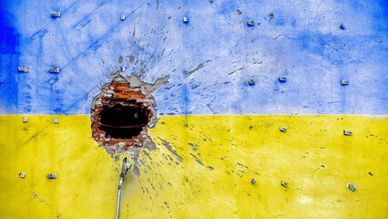 destroyed wall in the color of the national flag of Ukraine