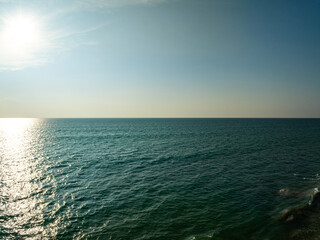 Fototapeta premium Amazing sea background,Summer blue sky over sea background,Beautiful ocean at Phuket island Thailand,High angle view drone shot