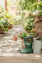 Green rubber boots for gardening.
