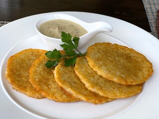 Potato pancakes enjoyed all over the world - boxties, raggmunk, latkes, deruny, draniki are made by pan frying grated until they are delicioulsy crispy on the outside and soft on the inside. 2024