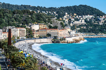 Nice view with blue sea and sunny weather, city and tourists people © frimufilms