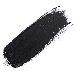 A thick brushstroke of black paint on a white background showing rough edges and artistic texture in close-up	