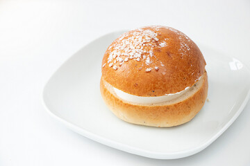 Traditional Finish sweet bun with whipped cream for Shrove Tuesday. Laskiaispulla.