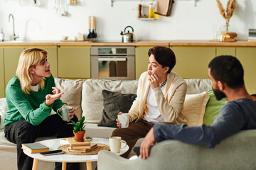 Engaging conversations among young men in a cozy book club setting at home