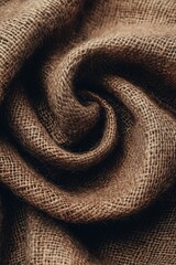 Fototapeta premium Mocha mousse fabric background with soft drapery in warm brown and beige tones, creating an elegant and stylish textile texture.