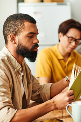 Engaging discussions and connections at a modern book club in a cozy home environment