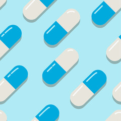 Blue medical capsules seamless pattern. Pills blue background. Capsules pattern in blue and white. A blue medical illustration. A diagonal seamless pattern with medical pills.