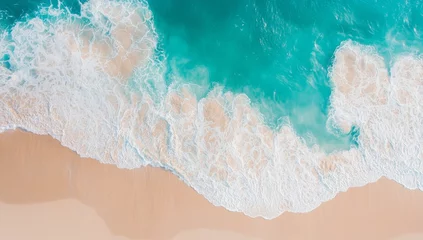 Fotobehang Waves gently lapping at the beach provide a stunning natural background, especially in summer © Bundi