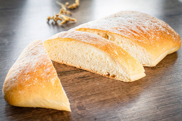 Craft sliced bread on the table at the bakery. The concept of small industries and healthy food