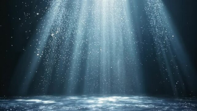 Light beams cascade down, creating a mesmerizing effect as they dance across the surface of tranquil water. Tiny particles glimmer, enhancing the peaceful atmosphere of this underwater view