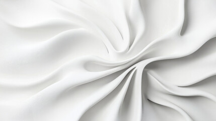 Fototapeta premium Smooth, luxurious white satin fabric drapes and folds, creating a mesmerizing swirl pattern with highlights and shadows that accentuate its texture
