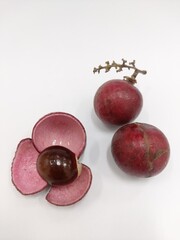 red longan, kelengkeng merah, dragon eye fruit. closeup. isolated on white background