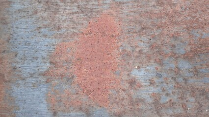 Rust on the iron door for the background. old peeling paint on rusty grates. Rusty metal texture.