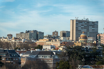 A vibrant cityscape with buildings and trees creating an urban feel