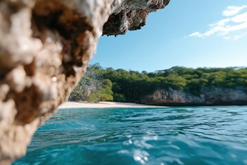 A breathtaking view of a hidden cove with glimmering crystal-clear waters, emphasized by the lush, verdant surroundings, inviting exploration and tranquility.