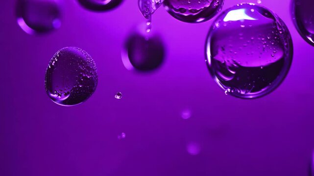 An eruption of deep violet berry juice droplets rushing toward the camera in slow motion, glossy and slightly sticky with a rich, organic texture, reflecting subtle purple hues under studio lighting 