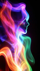 Obraz premium Abstract colorful light painting forming a human profile. Vibrant hues and dynamic energy.