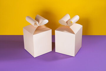 Mock-up of a box with bows for transportation of baked goods, cakes