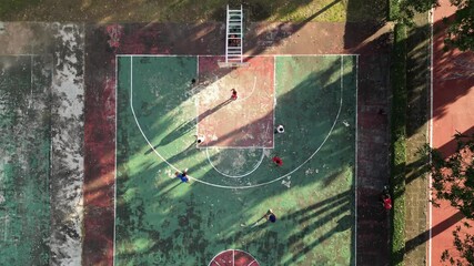 People playing on a sports field. Drone video. Part 6