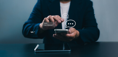 Chat Bot, Chat with AI or Artificial Intelligence technology, Human using smartphone to chatting with an intelligent artificial intelligence asks for the answers he wants, Chat Ai bot.