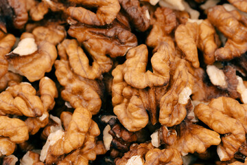 Walnut kernels isolated on white background. Walnuts close-up. Healthy eating. Half of walnut isolated. Peeled walnut on white.