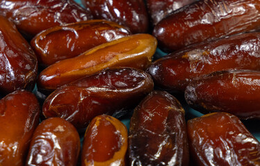Close-up with dehydrated dates. Dried fruits background