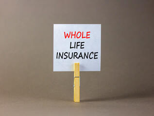 Whole life insurance symbol. Concept words Whole life insurance on beautiful white paper on...