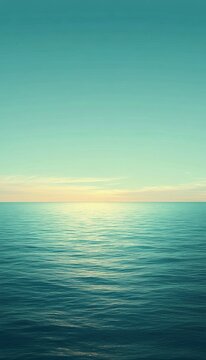 Serene ocean sunset. Calm water meets a tranquil sky, creating a peaceful and picturesque scene.