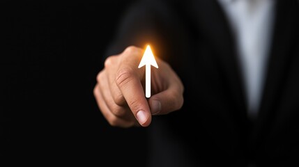 A business professional pointing with a glowing arrow against a dark background.