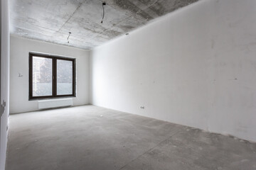 interior of the apartment without decoration in gray colors. rough finish