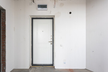 interior of the apartment without decoration in gray colors. rough finish