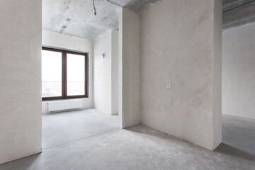interior of the apartment without decoration in gray colors. rough finish