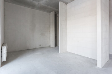 interior of the apartment without decoration in gray colors. rough finish