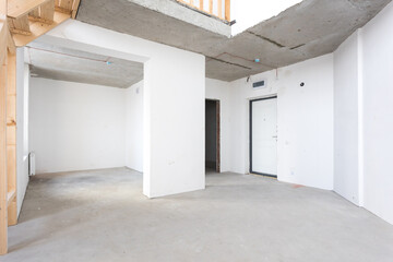interior of the apartment without decoration in gray colors. rough finish