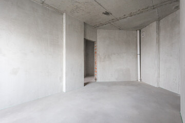 interior of the apartment without decoration in gray colors. rough finish