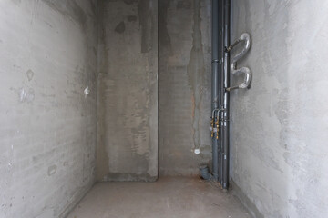interior of the apartment without decoration in gray colors. rough finish