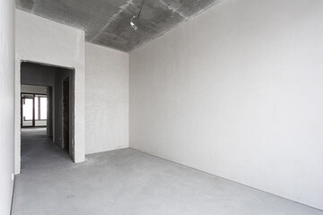 interior of the apartment without decoration in gray colors. rough finish