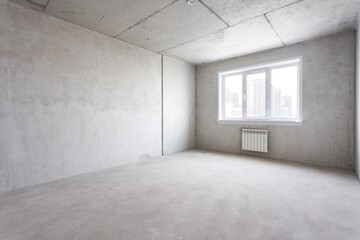 interior of the apartment without decoration in gray colors. rough finish