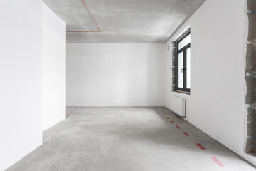 interior of the apartment without decoration in gray colors. rough finish